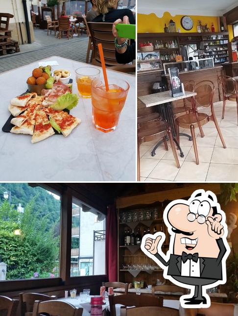 Dai un’occhiata alla foto che presenta la interni e bevanda di Cervo Bistrot