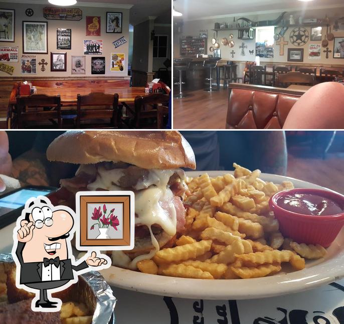 The photo of interior and burger at Hot Rod Cafe