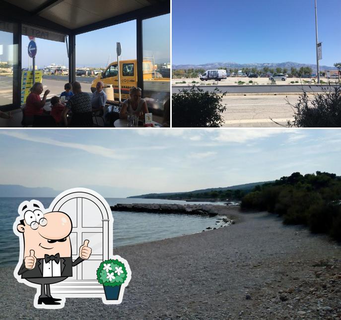 Goditi la vista dall'area esterna di Fast Food Gricko