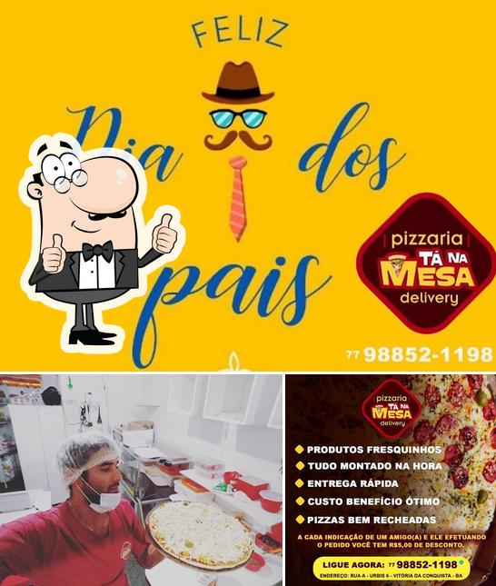 Here's an image of Pizzaria Tá na Mesa Delivery