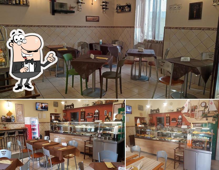 Siediti a un tavolo di Pizzeria tavola calda "GIUSY" (Dubon)