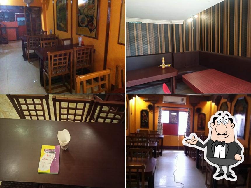 Take a seat at one of the tables at Shillong Restaurant