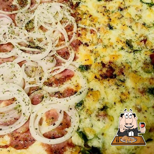 No PIZZARIA MARCHETTONI, você pode provar pizza