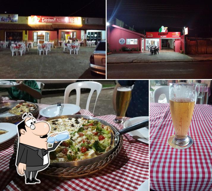 A imagem a Divinati Pizzaria’s bebida e exterior