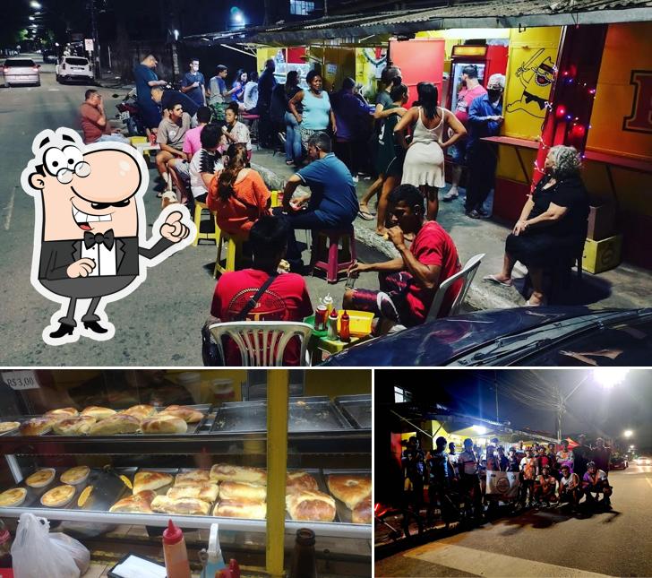 A ilustração da exterior e comida no Lanche do Gato Doido