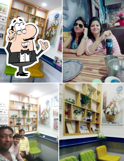 Take a seat at one of the tables at Giani Ice Cream (Munirka)