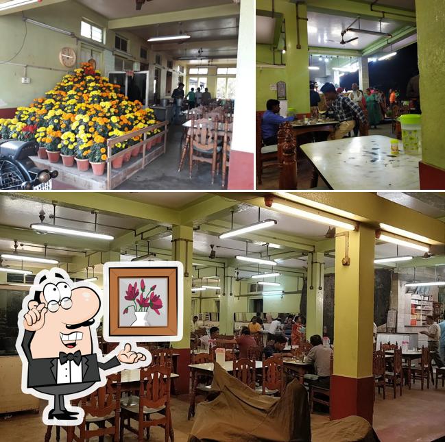 Take a seat at one of the tables at SANKAR MISTANNA PRATISTHAN