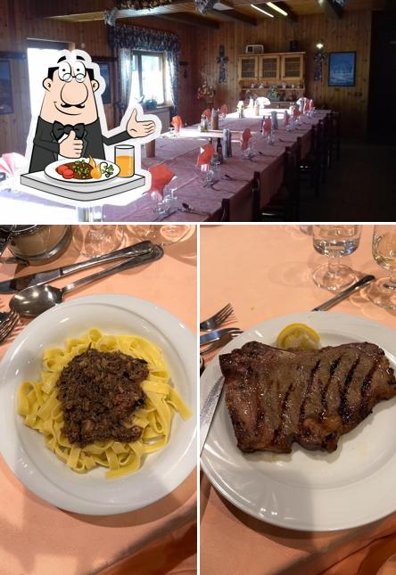 Questa è la immagine che presenta la cibo e interni di Osteria al Tornante