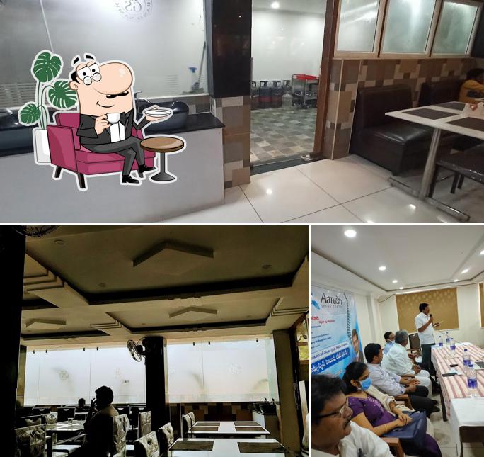 Take a seat at one of the tables at Grand samrat