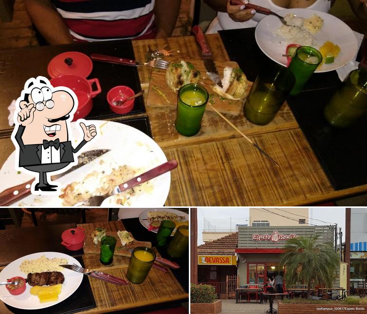 A ilustração da interior e mesa de jantar no Brasa Bonito Steakhouse
