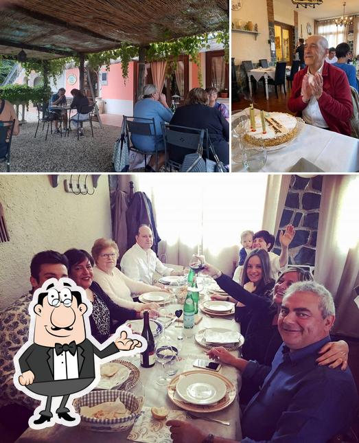 La foto di interni e esterno da Trattoria Pessenti