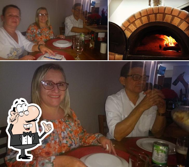 O interior do Pizzaria Ebo & Lima