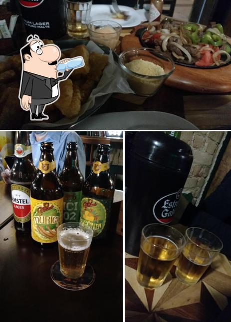 Dê uma olhada a imagem apresentando bebida e comida no Madera Bar