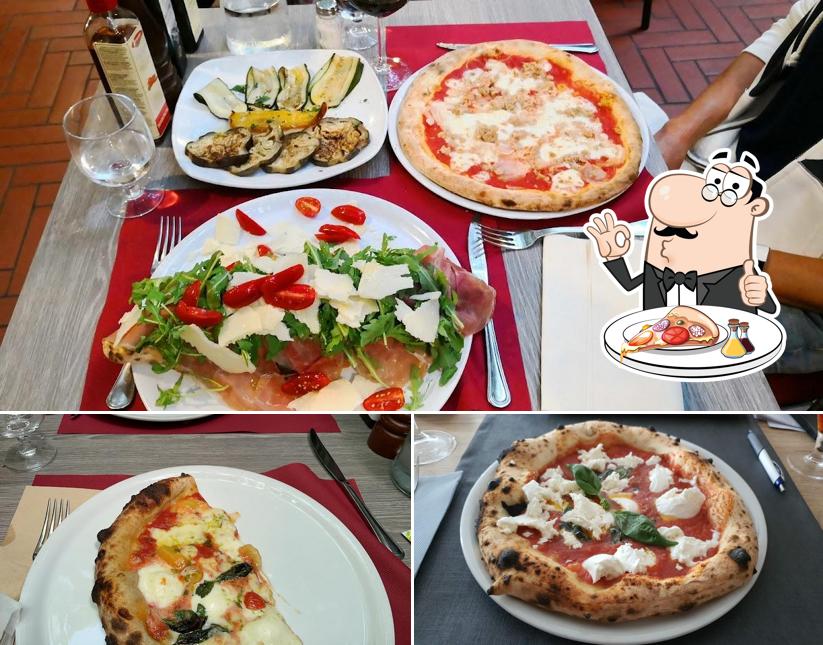 Prenditi una pizza a Taverna del Pappagallo Ristorante e Pizzeria