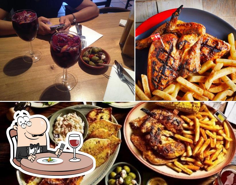 The photo of food and wine at Nando's Harrow - St George