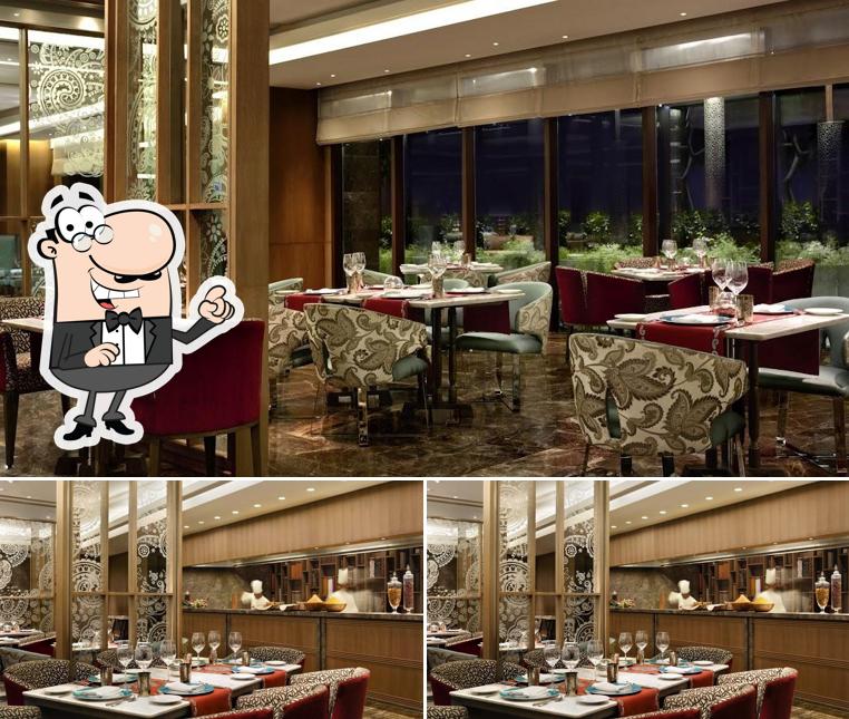 Take a seat at one of the tables at Dilli 32