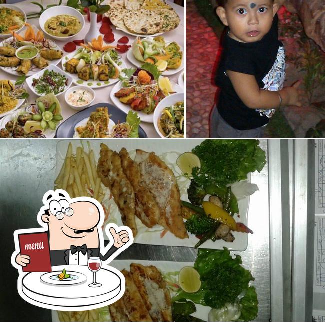 Check out the image depicting food and interior at Chef Amir