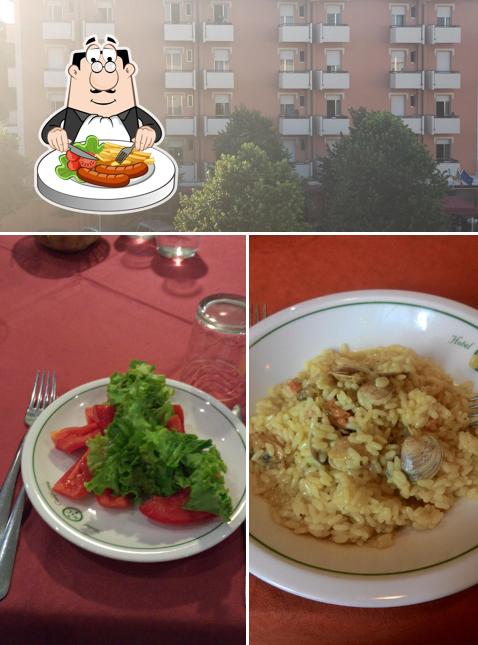 Dai un’occhiata alla immagine che mostra la cibo e esterno di Hotel Aron