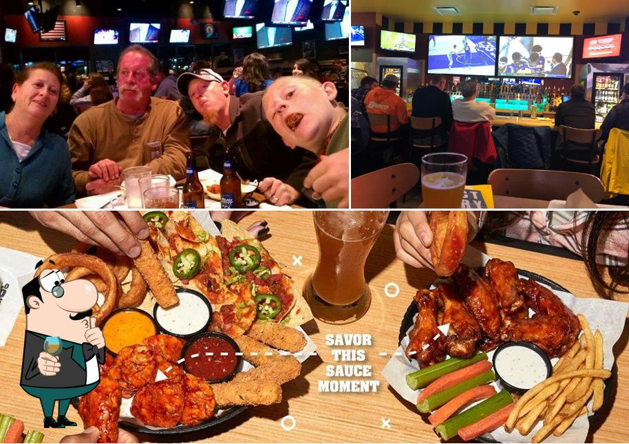 The image of Buffalo Wild Wings’s bar counter and dining table