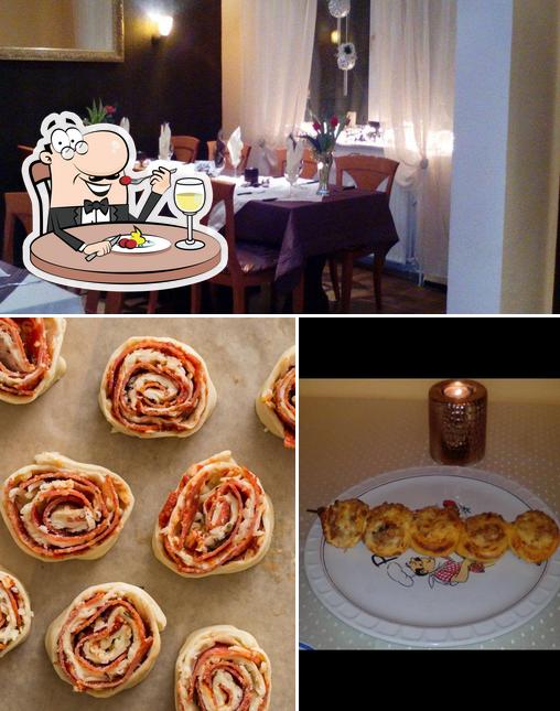Mira las fotografías que muestran comida y interior en Pizzeria Stella Marina