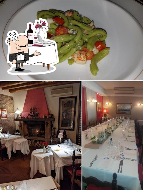 Jetez un coup d’oeil à l’image indiquant la table à manger et nourriture concernant Albergo Ristorante Molteni