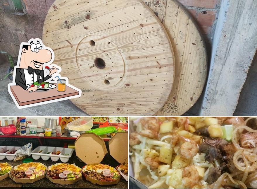 O Pizzas Tileila Delivery se destaca pelo comida e interior