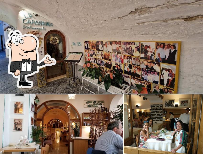 Dai un’occhiata alla foto che raffigura la interni e tavolo da pranzo di Ristorante La Capannina