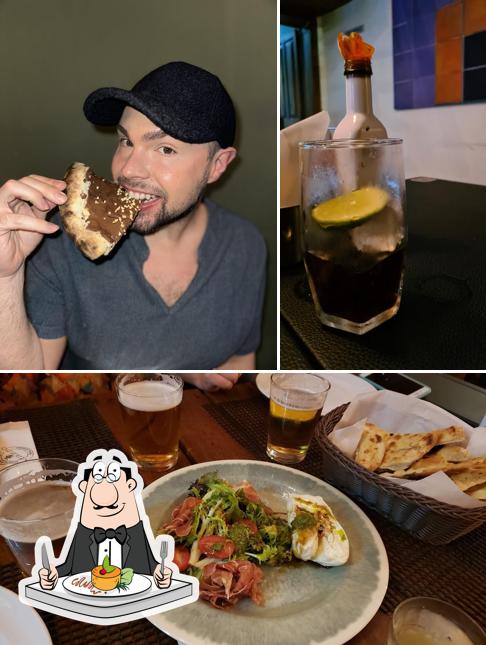 A imagem da comida e cerveja a Mazzo Pizzaria