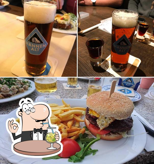This is the image showing drink and burger at Oedinger Zur Waldesruh