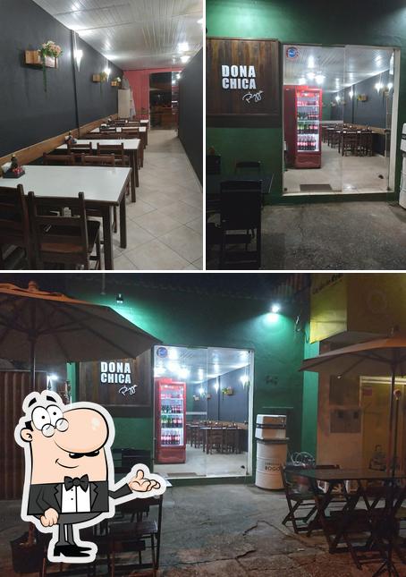 O interior do Pizzaria Dona Chica