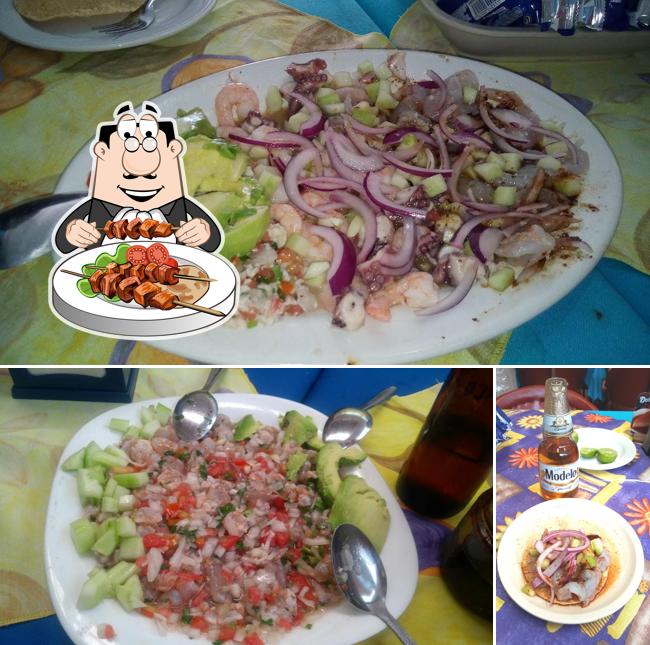 The picture of food and beer at Mariscos El Carnal