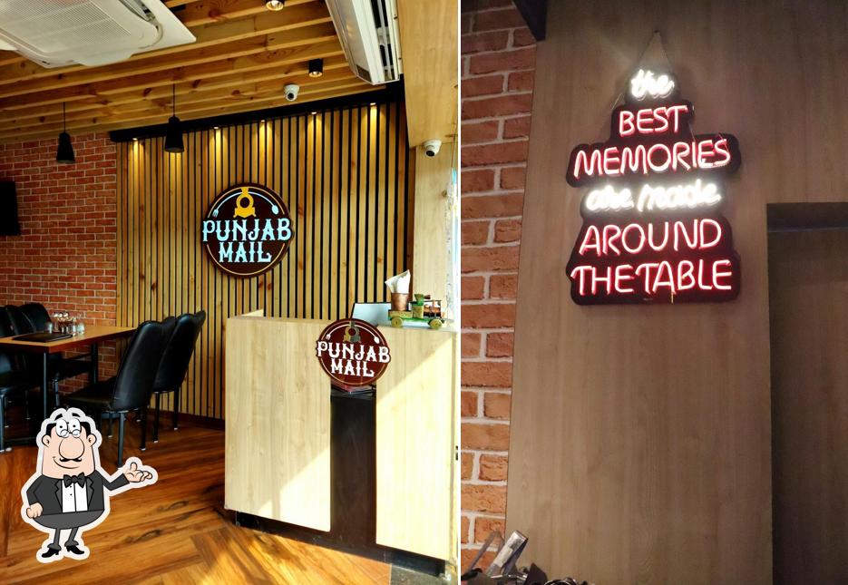 Take a seat at one of the tables at Punjab Mail -Family Restaurants in Patiala, 24 Hours Restaurant, Party Hall in Patiala