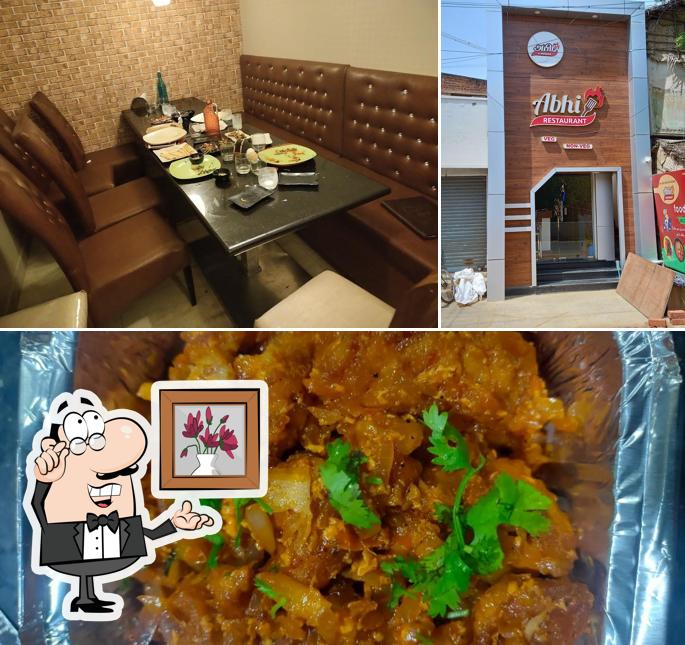 Check out the image showing interior and food at Abhi Restaurant