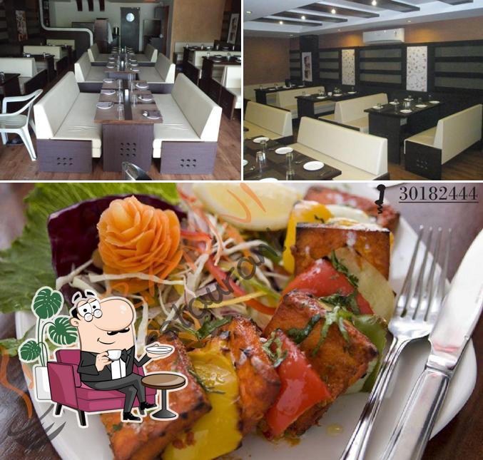 Take a look at the image showing interior and food at Shivranjni Cafe & Restaurant