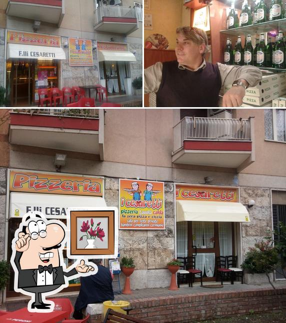 Questa è la immagine che mostra la interni e bancone da bar di pizzeria i cesaretti Ciampino