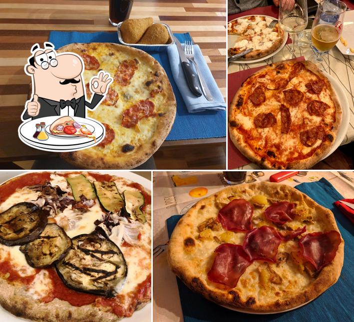A Isola Bella Pizzeria, puoi provare una bella pizza
