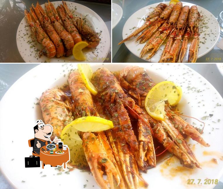 Ordina la cucina di mare a Restoran Plaža