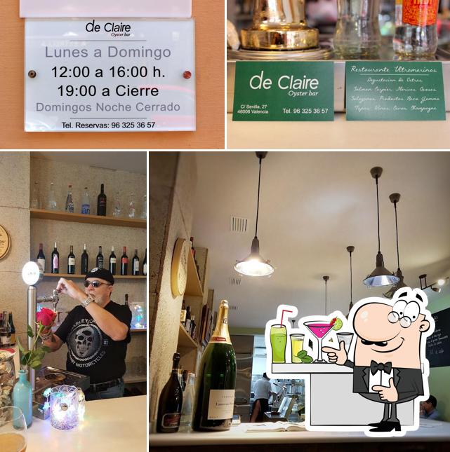 Это фотография, где изображены барная стойка и пиво в De Claire Oyster bar