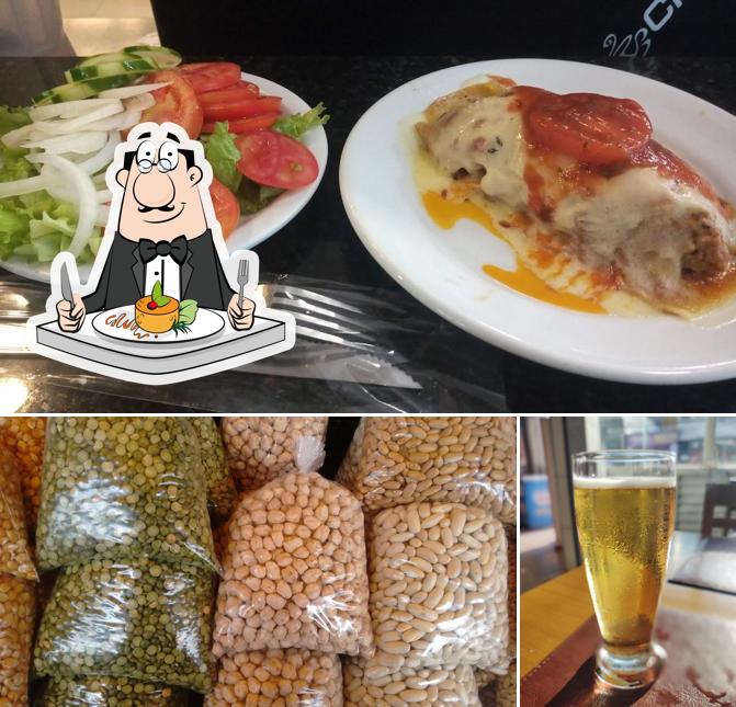 Dê uma olhada a imagem ilustrando comida e cerveja a Marisa Panificadora