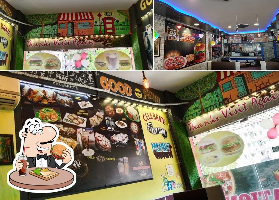 Order a burger at CELEBRATION CAFE