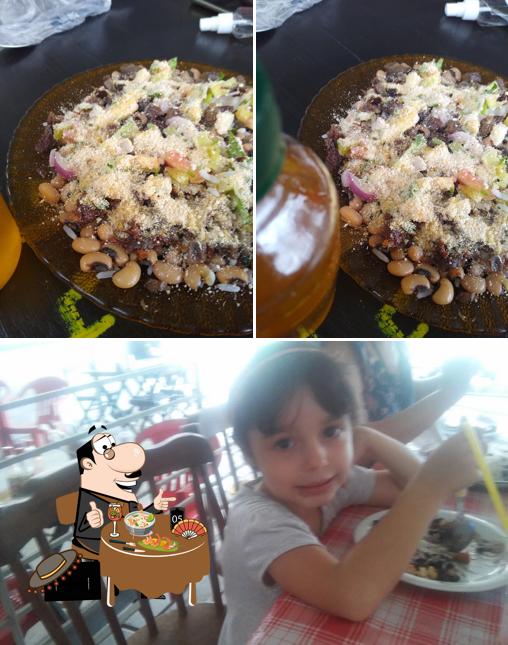 A ilustração do Tadeus Restaurante’s comida e interior