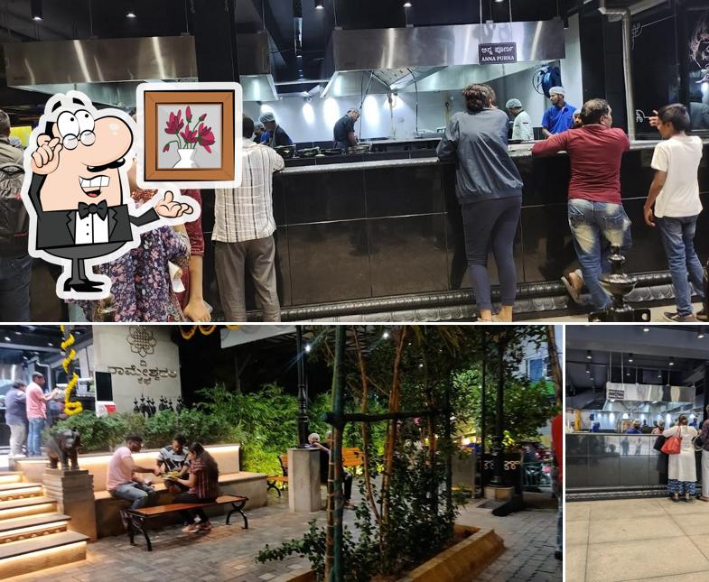 Take a seat at one of the tables at The Rameshwaram Cafe @ Rajajinagar