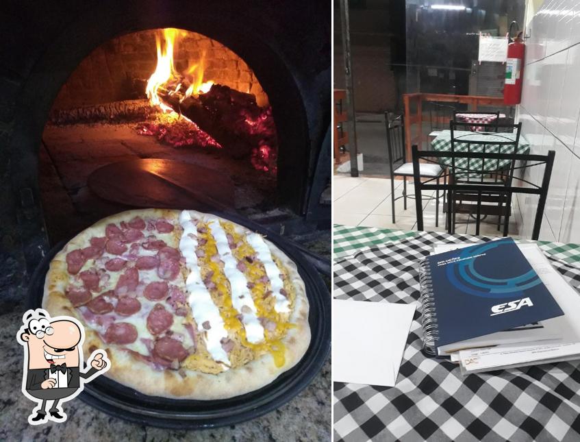 O interior do PIZZARIA NICK´BELLY