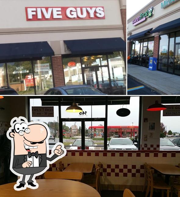 The picture of exterior and interior at Five Guys