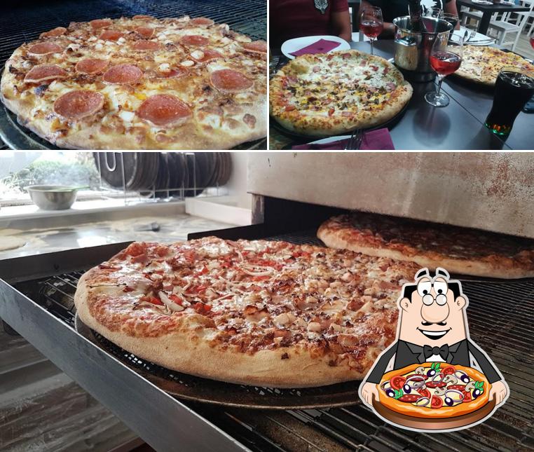 At Pizzerías Carlos, you can try pizza
