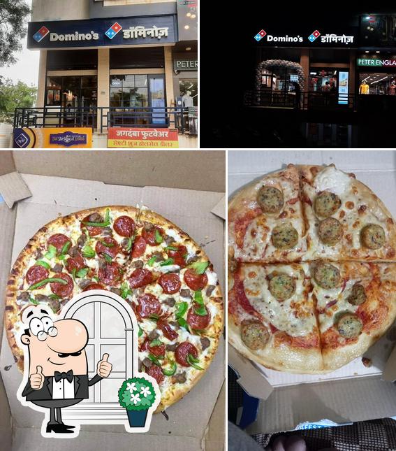 Check out the photo showing exterior and food at Domino's Pizza