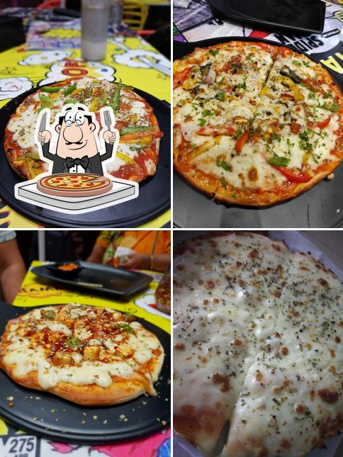 Try out pizza at The SuperHero Cafe