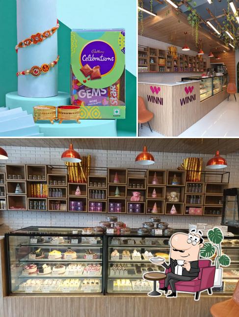 The picture of interior and food at Winni Cakes & More