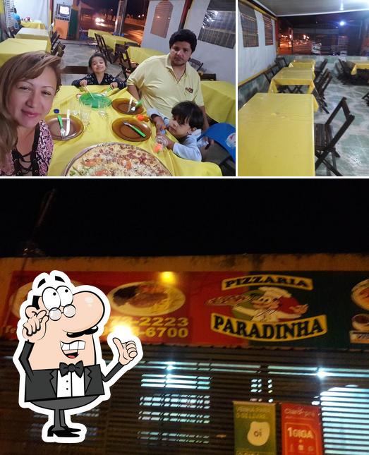 O interior do Pizzaria Paradinha