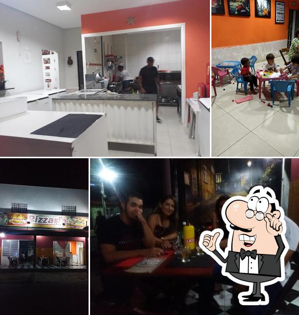 O interior do Pizzaria do Pixunxa